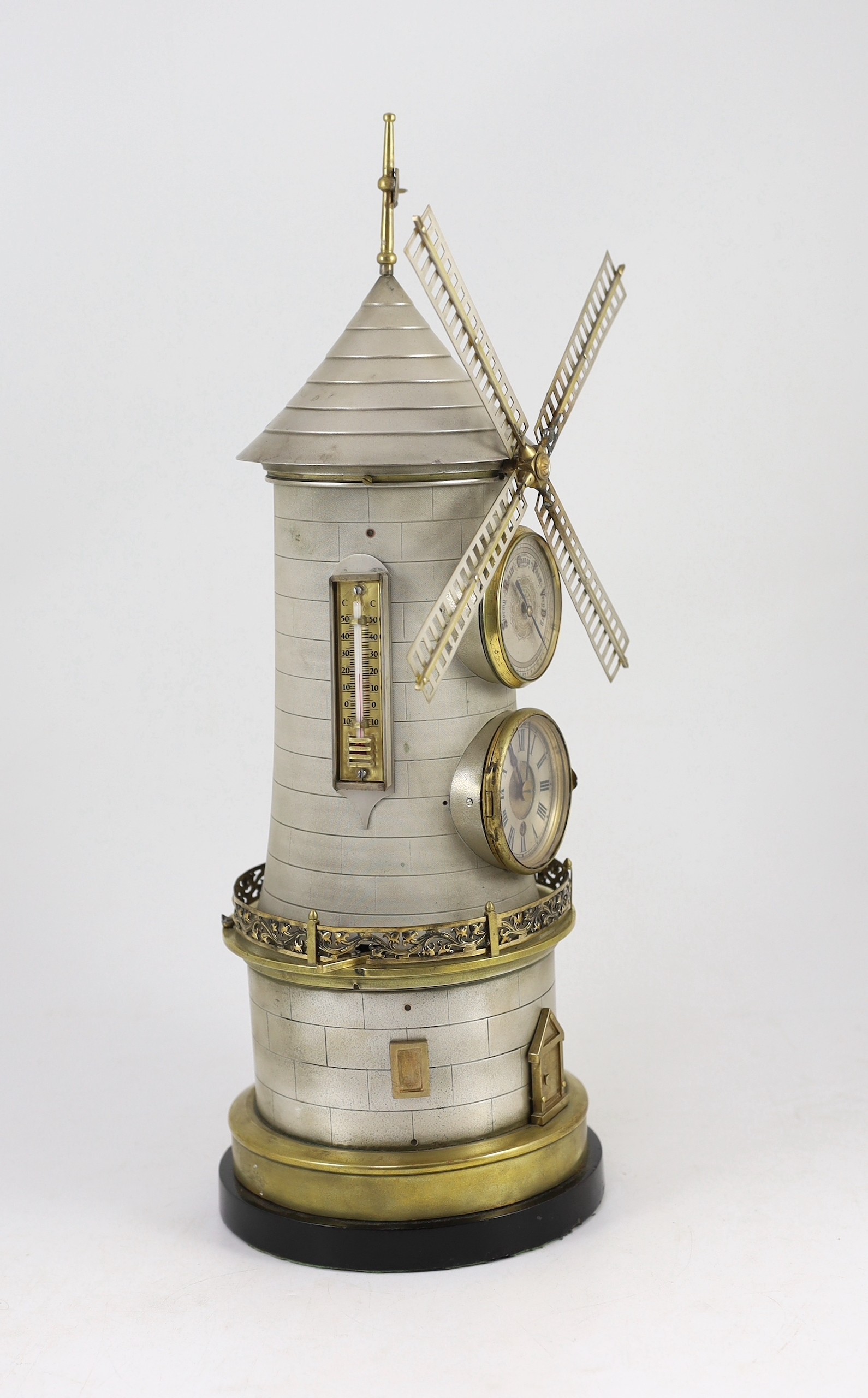 A 19th century French industrial windmill clock, by Guilmet Height 47cm.